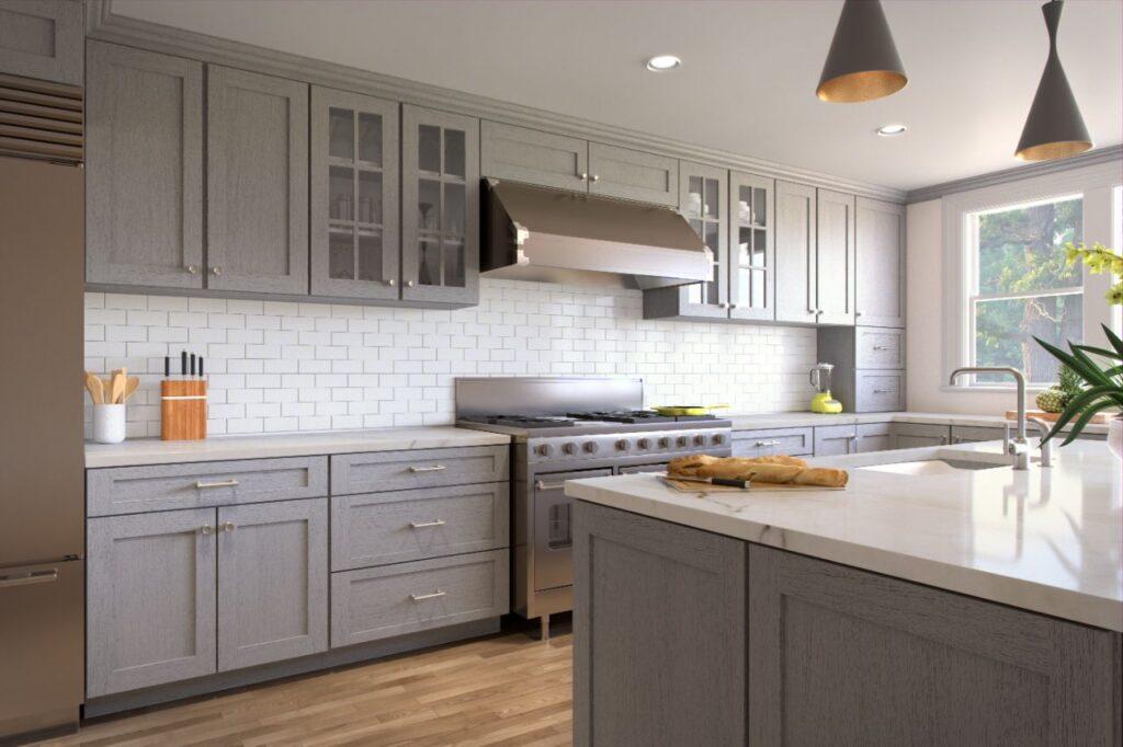 A Forevermark Cabinetry kitchen featuring gray cabinets and stainless steel appliances.