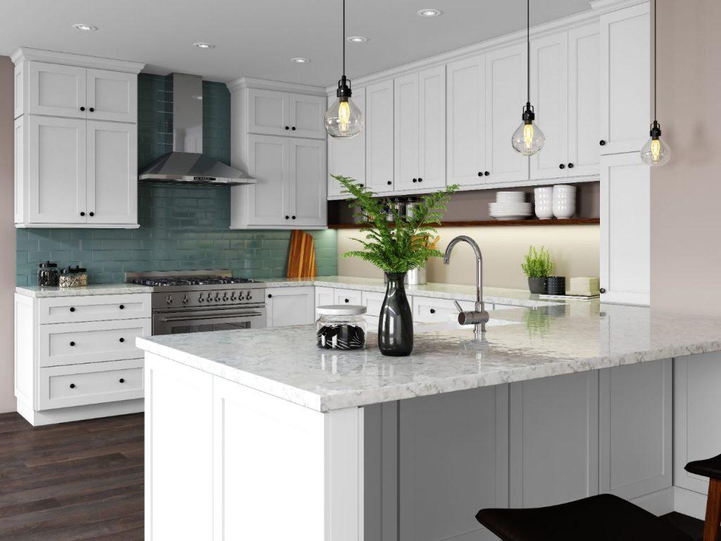 a white kitchen interior design with white marble island and white wooden kitchen cabinets by mykitchencabinets