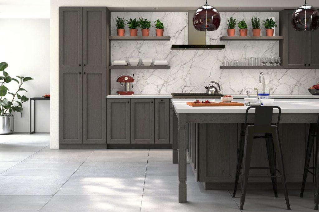 a simple kitchen with small marble island and gray wooden kitchen cabinets by mykitchencabinets